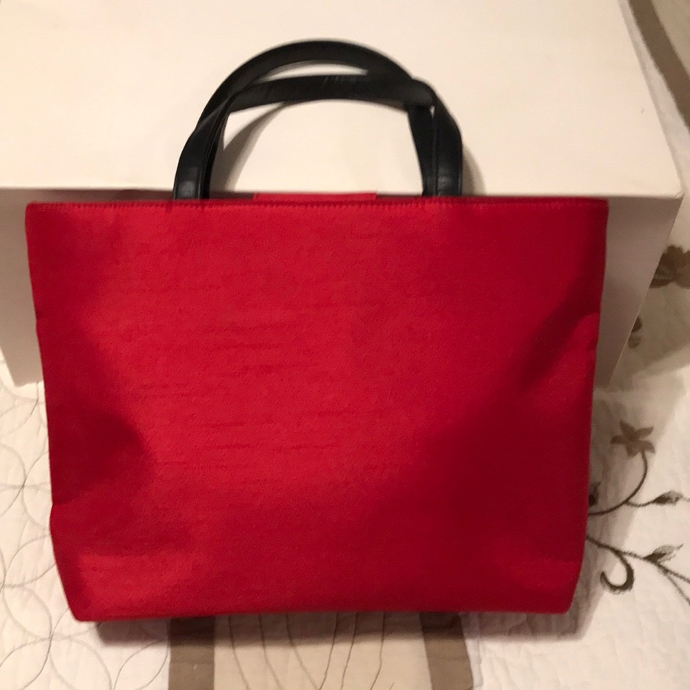 Mr HI’s Red hat & Preston York silk handbag